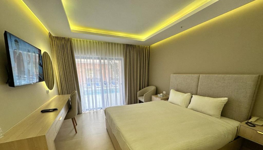 TV a/nebo společenská místnost v ubytování Petra Palace Hotel