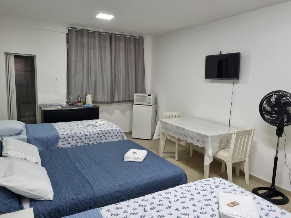 Ένα ή περισσότερα κρεβάτια σε δωμάτιο στο Kit 504 Asa SUL -Residencial Espaço Brasília Confort KIT 201
