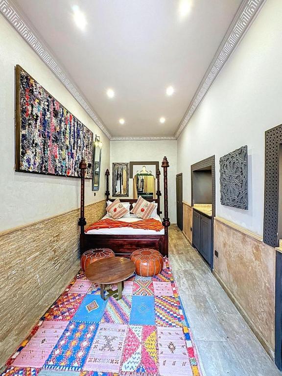 Postel nebo postele na pokoji v ubytování Le Riad Medina Privilège and Spa