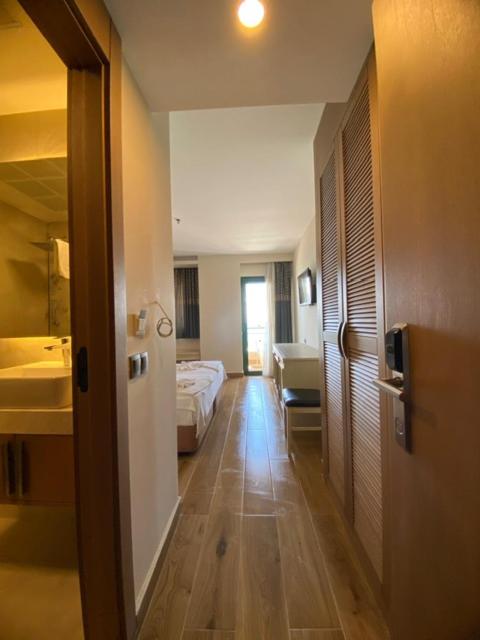 Postel nebo postele na pokoji v ubytování Hotel Mutlu