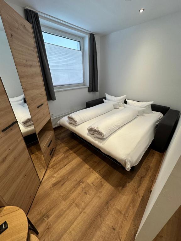 Postel nebo postele na pokoji v ubytování Deluxe Apart Bader