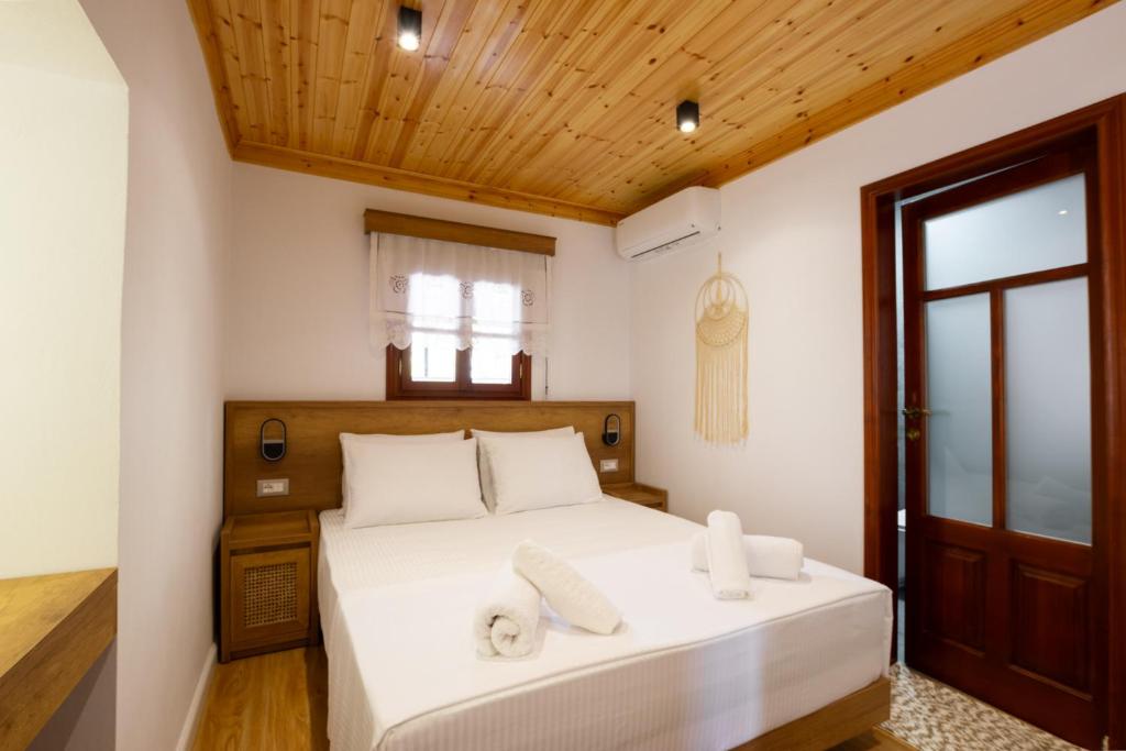 Postel nebo postele na pokoji v ubytování Guesthouse Lani