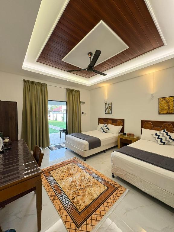 Postel nebo postele na pokoji v ubytování Eleven25 Roomstay