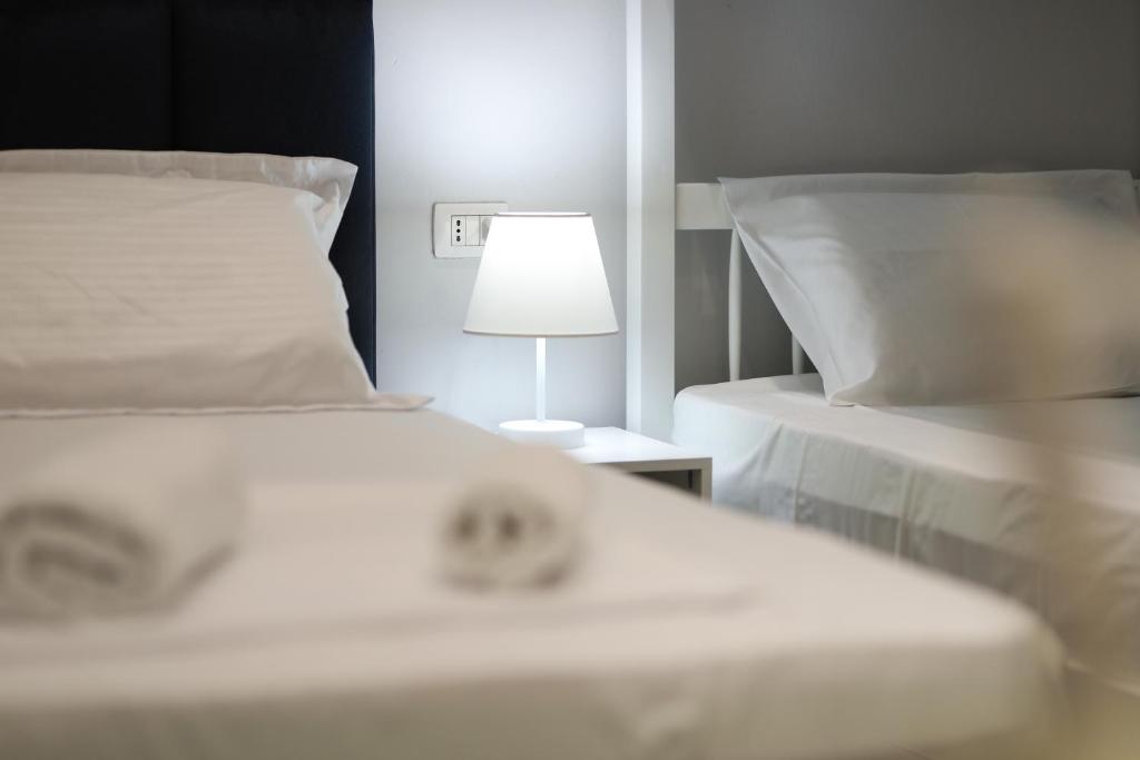 Postel nebo postele na pokoji v ubytování Vila Feliz - Premium Rooms with Free Private Parking