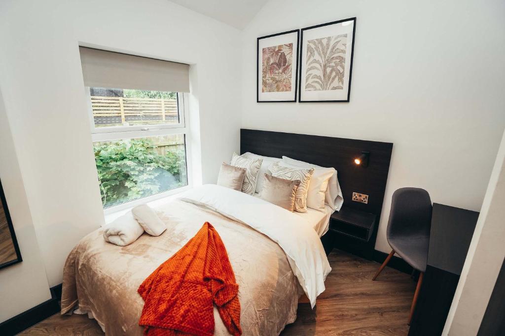 Ένα ή περισσότερα κρεβάτια σε δωμάτιο στο No46 Stylish City Studio Apartment, By DerBnB