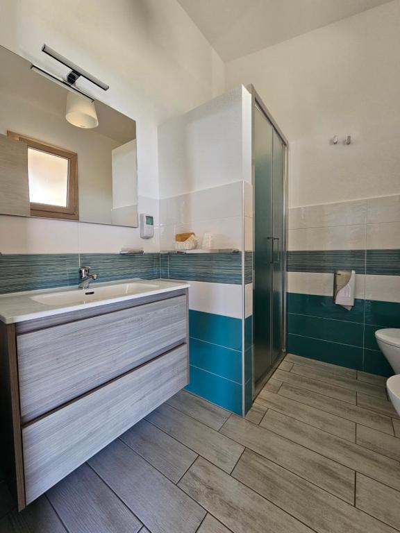 Koupelna v ubytování Hotel Pranos Turismo Rurale Cala Gonone
