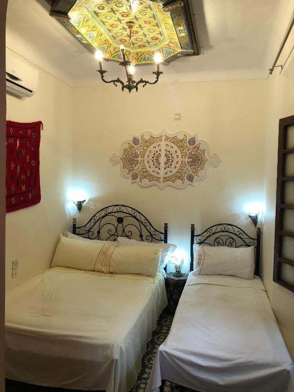 Cama o camas de una habitación en Dar Lalla Wafae
