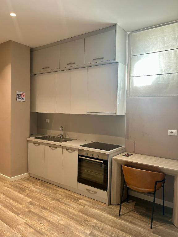 Kuchyň nebo kuchyňský kout v ubytování Guza Apartments