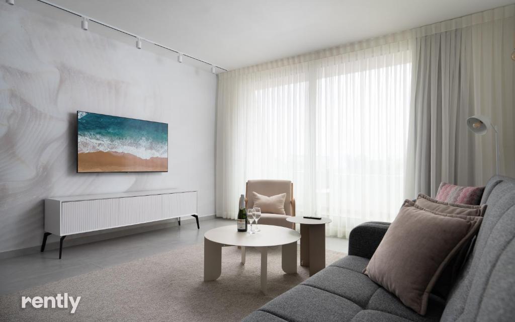 Posezení v ubytování Luxury Apartments And Studios At Sea Side By Rently