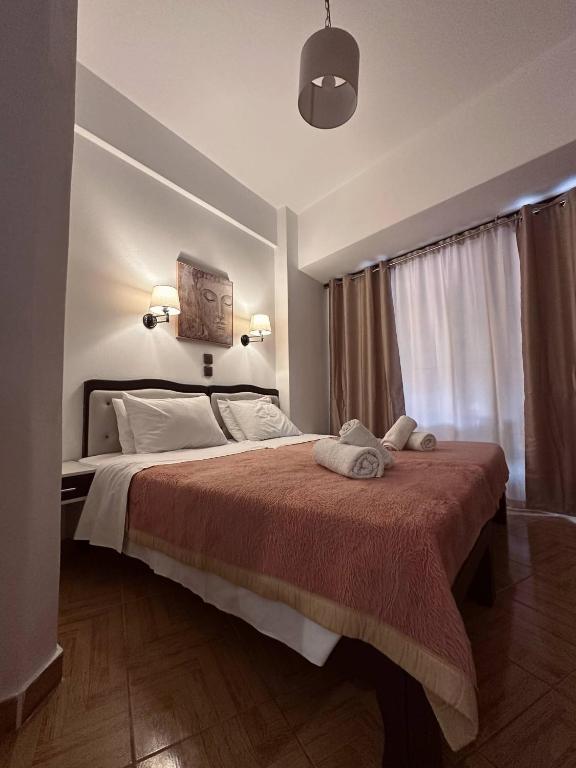 Postel nebo postele na pokoji v ubytování Studios Souropanis