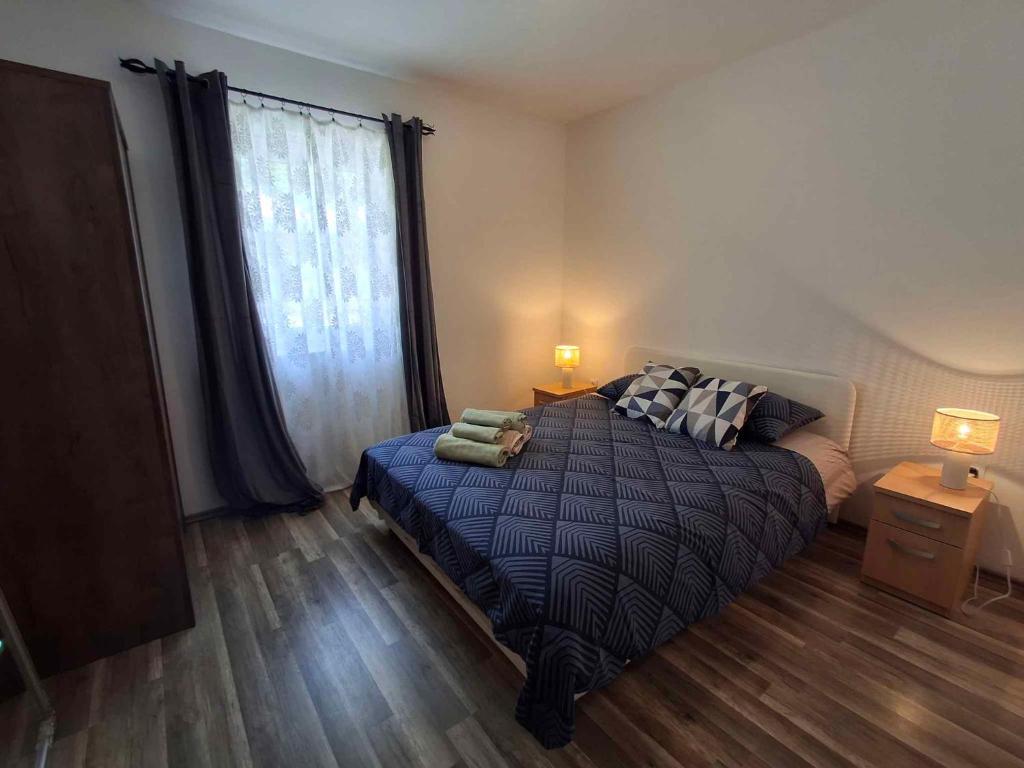 Postel nebo postele na pokoji v ubytování Holiday Homes in Rovinj/Istrien 11675