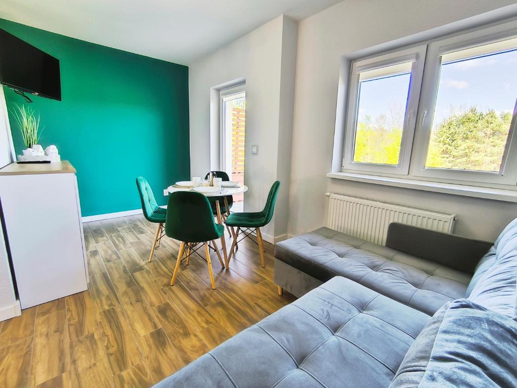 Televízia a/alebo spoločenská miestnosť v ubytovaní Willa Panorama 881-751-206