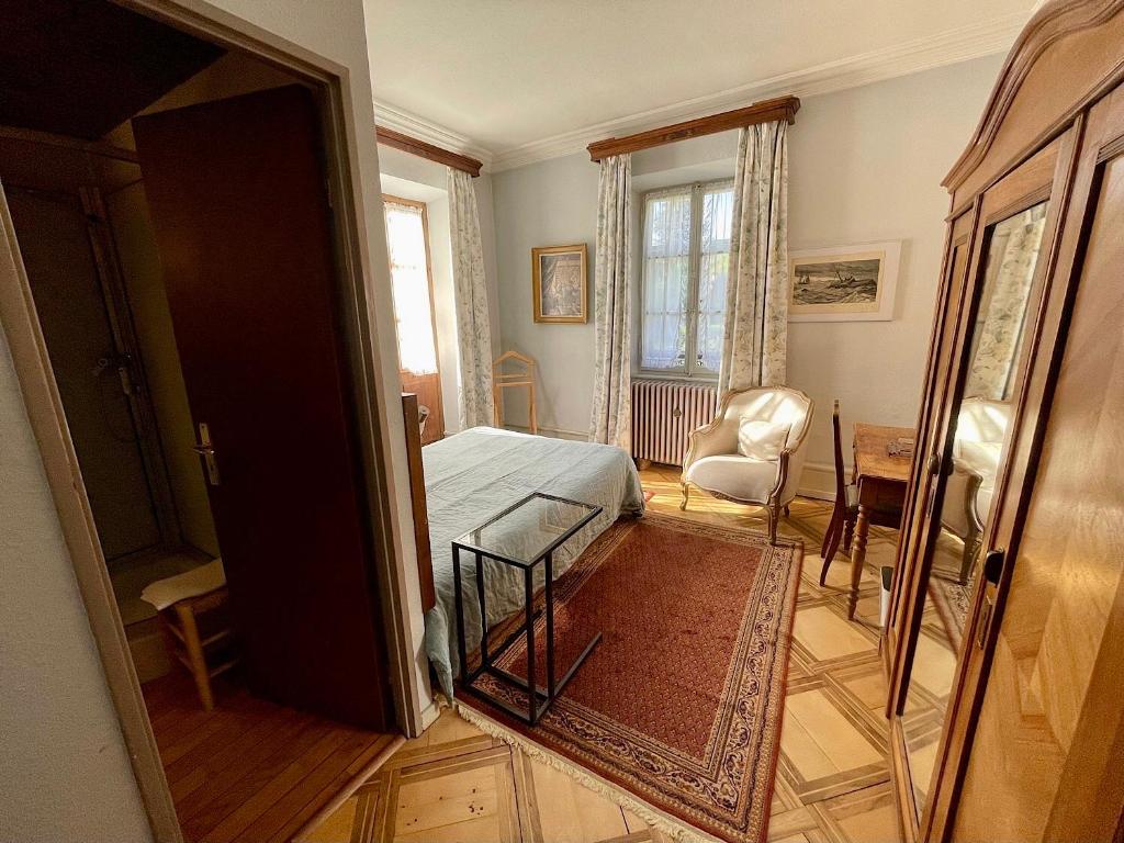 Postel nebo postele na pokoji v ubytování Hôtel La Rubanerie
