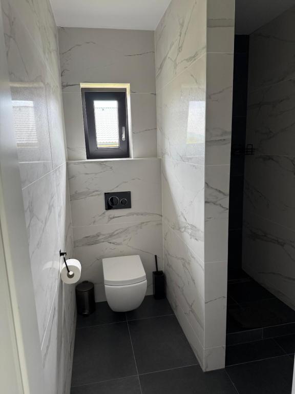 Koupelna v ubytování Guesthouse