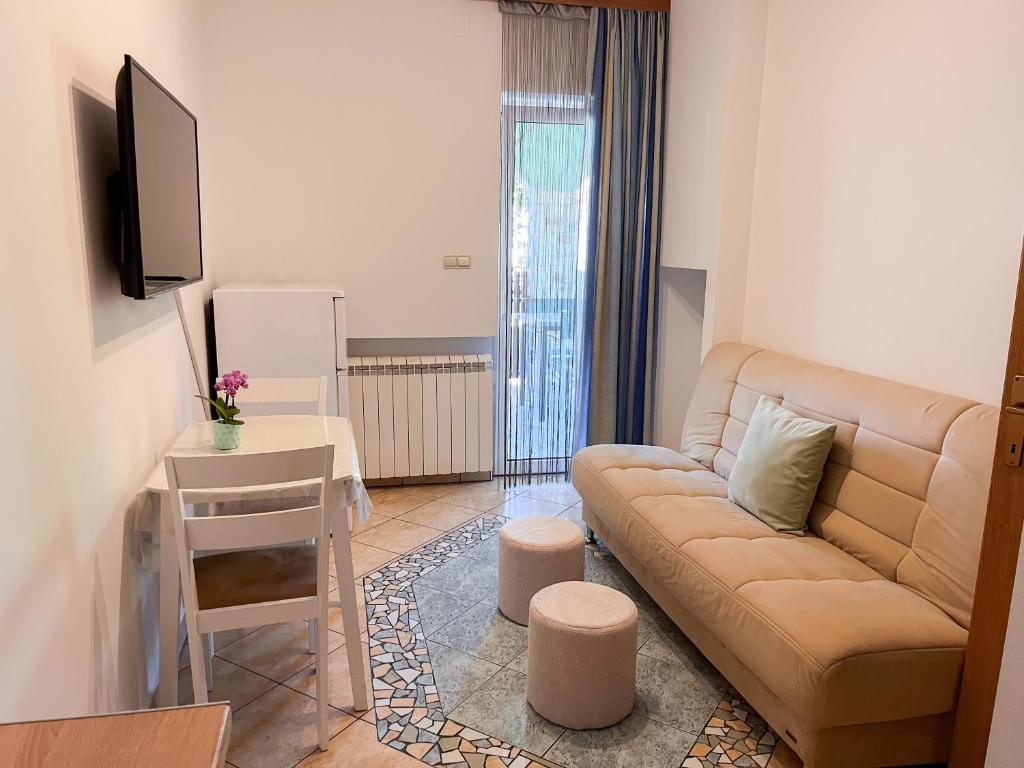 Predel za sedenje v nastanitvi Apartman 2
