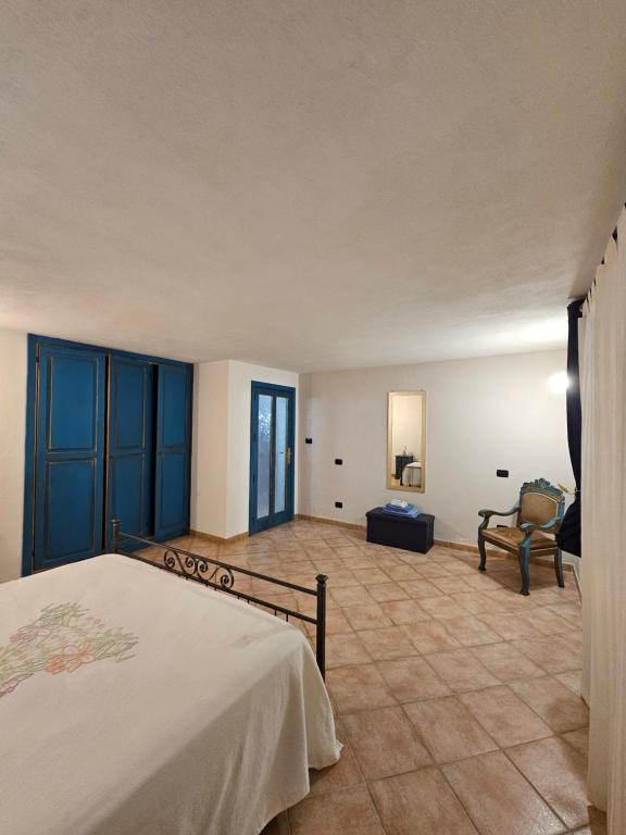 Postel nebo postele na pokoji v ubytování Villantoine De La Marina Di Orosei