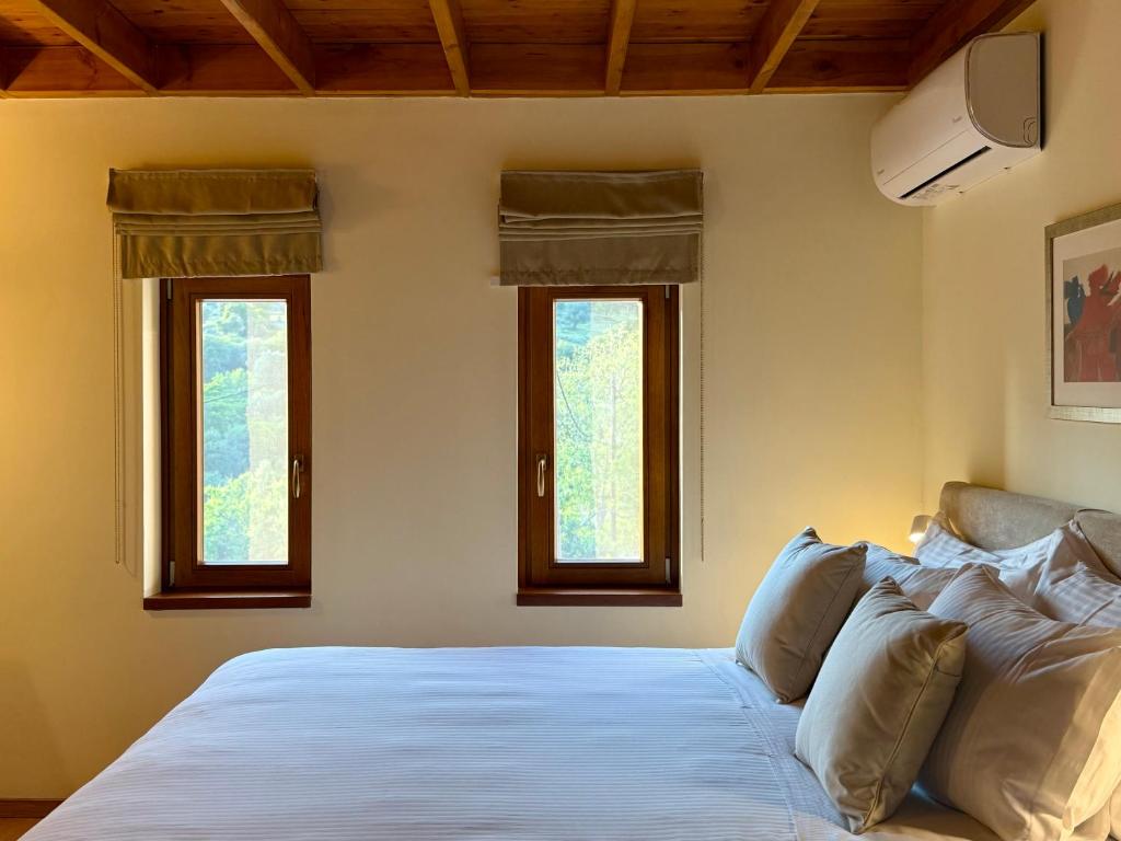 Posteľ alebo postele v izbe v ubytovaní Greenview Maisonnette
