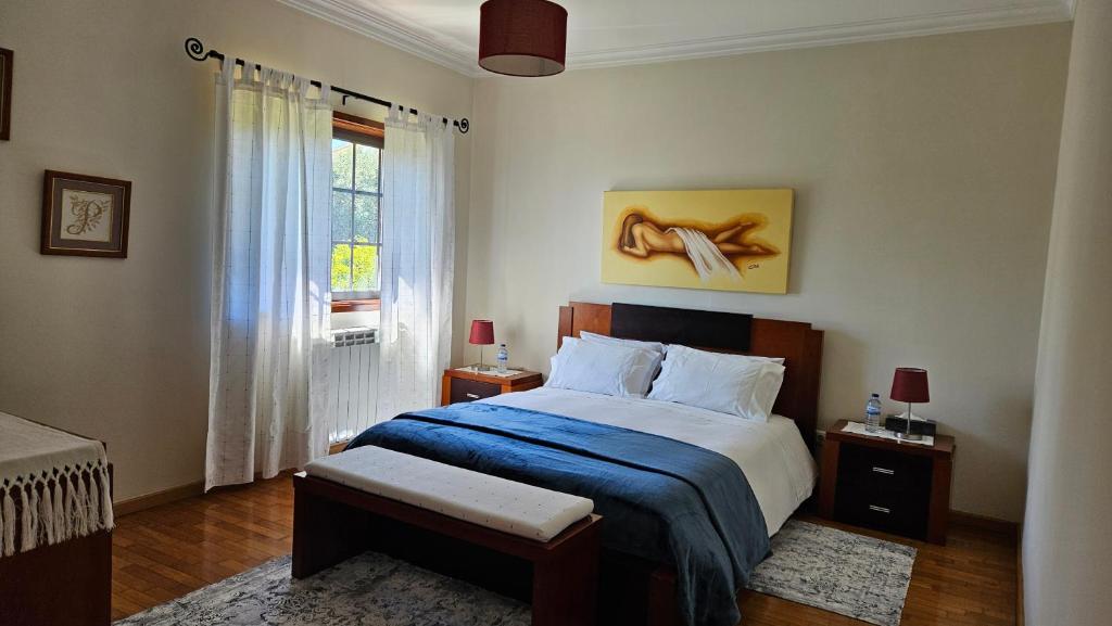 Postel nebo postele na pokoji v ubytování Suite em Viana do Castelo
