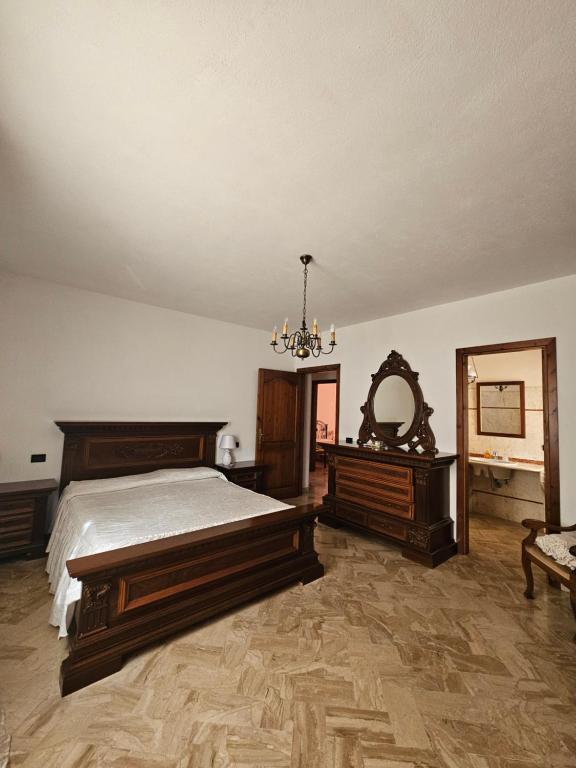 Postel nebo postele na pokoji v ubytování Villantoine De La Marina Di Orosei