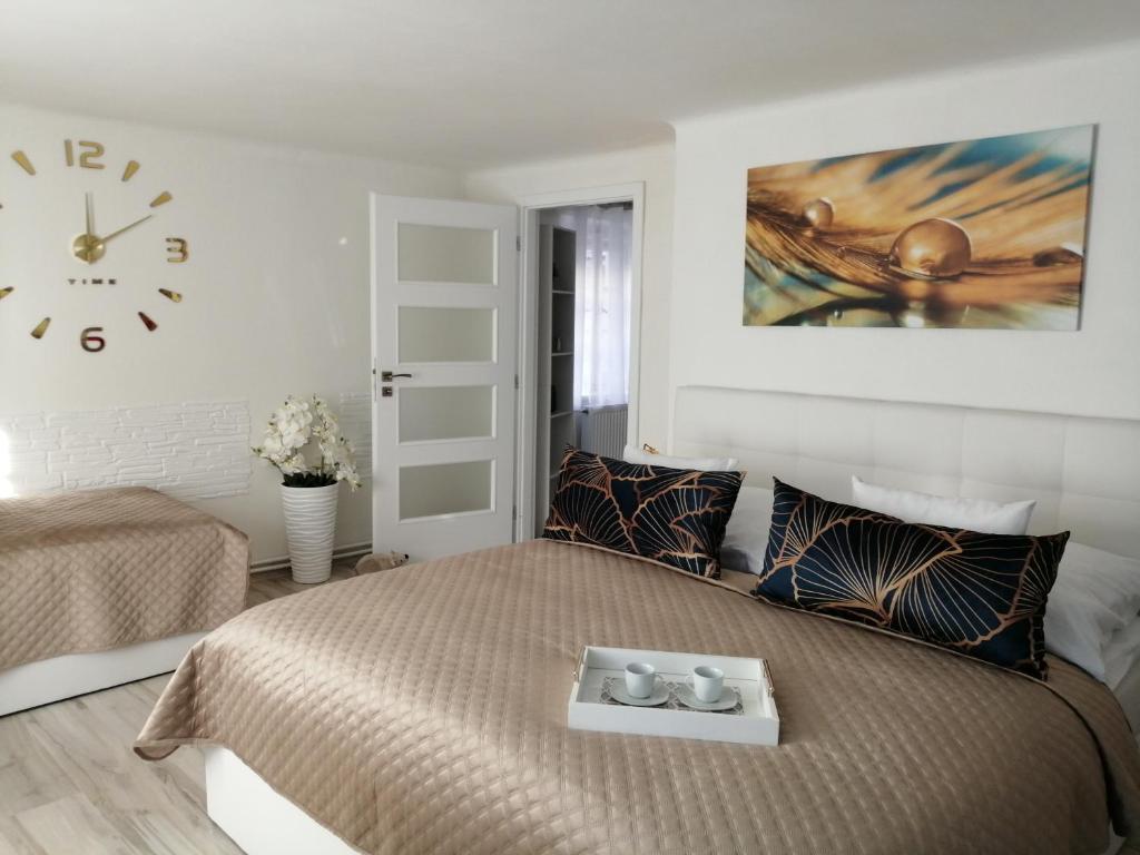 Postel nebo postele na pokoji v ubytování Apartman Deluxe Cheb