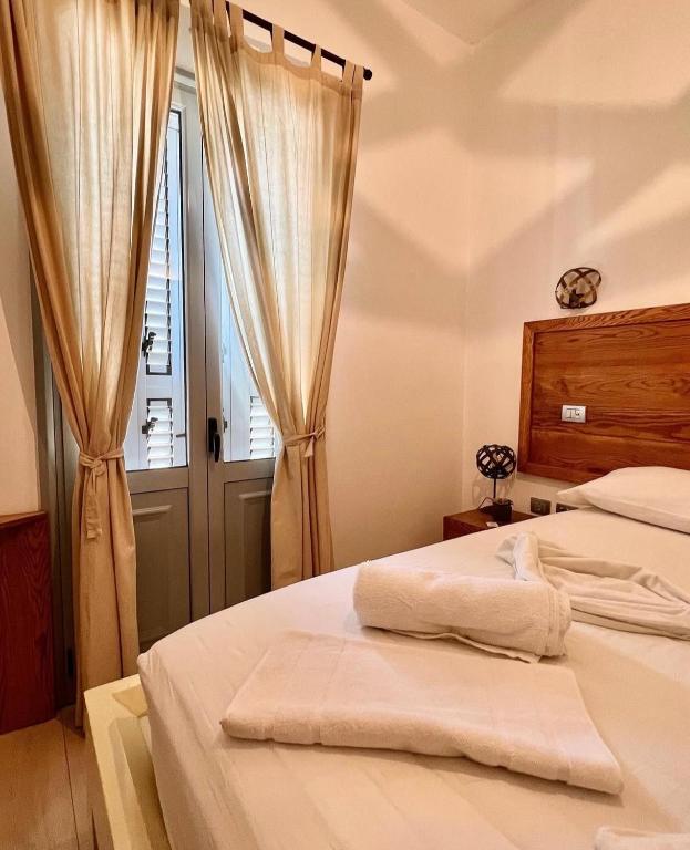Postel nebo postele na pokoji v ubytování Guesthouse 1932