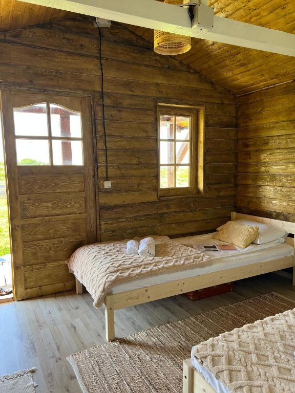Postel nebo postele na pokoji v ubytování Serenity Retreats Maciuca