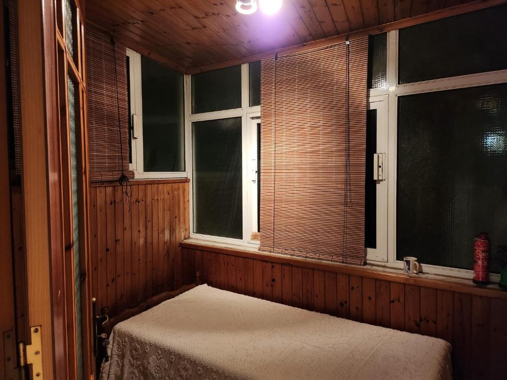 Ένα ή περισσότερα κρεβάτια σε δωμάτιο στο House ROSI in Rodos city