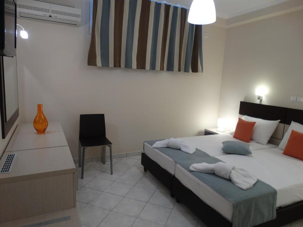 Postel nebo postele na pokoji v ubytování Al Mare Hotel