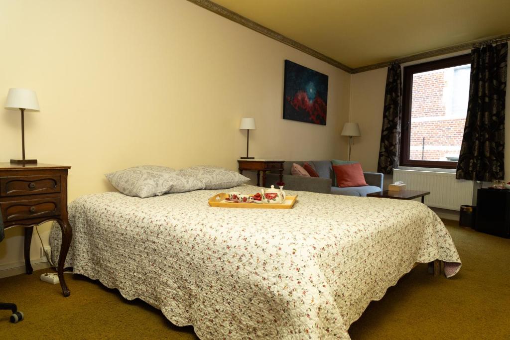 Postel nebo postele na pokoji v ubytování Hotel De Pastorij