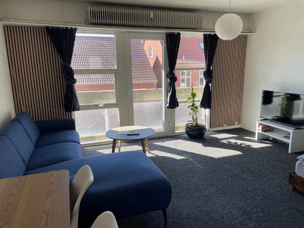 Ruang duduk di Cozy Stay, 10 Min to Esbjerg Centrum