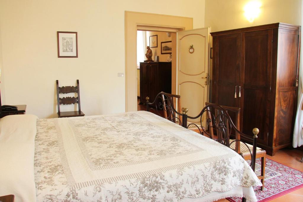 Postel nebo postele na pokoji v ubytování B&B L'Agnolo Di Caroti Cinzia