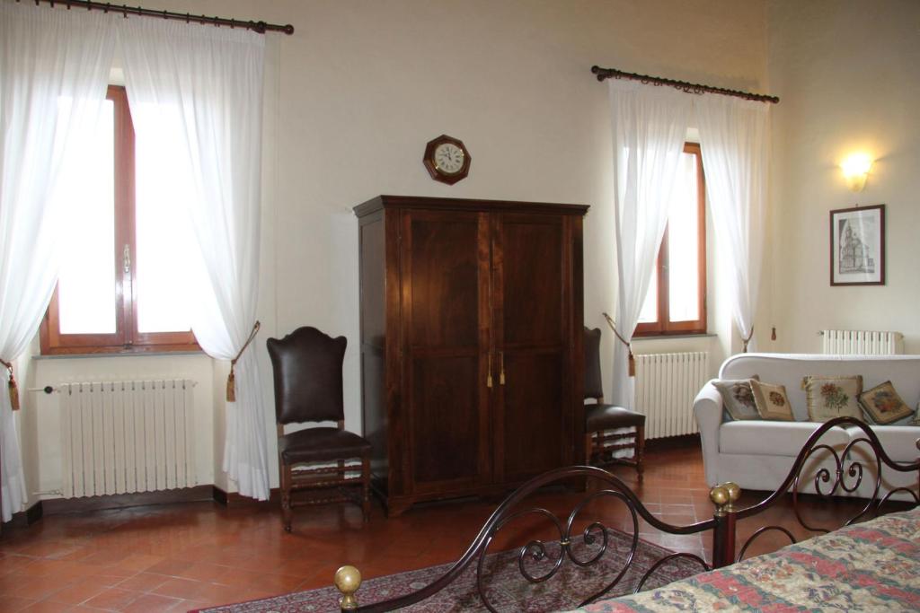Postel nebo postele na pokoji v ubytování B&B L'Agnolo Di Caroti Cinzia