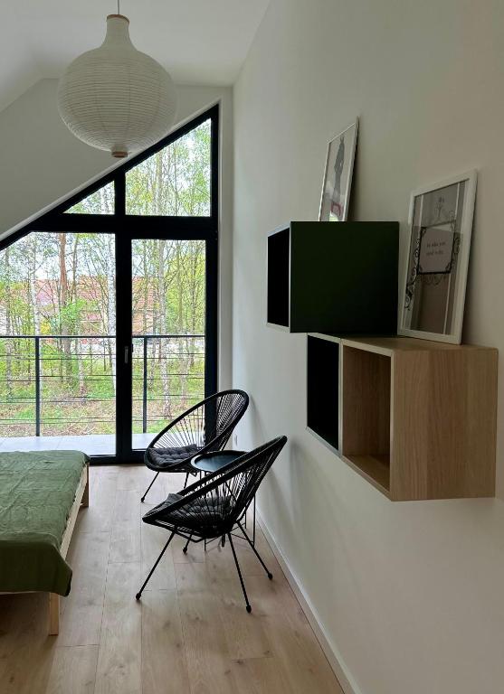 TV a/nebo společenská místnost v ubytování Łagowski Reset