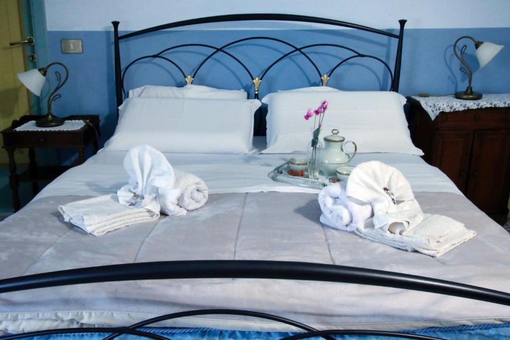 Łóżko lub łóżka w pokoju w obiekcie Bed&Breakfast 1912