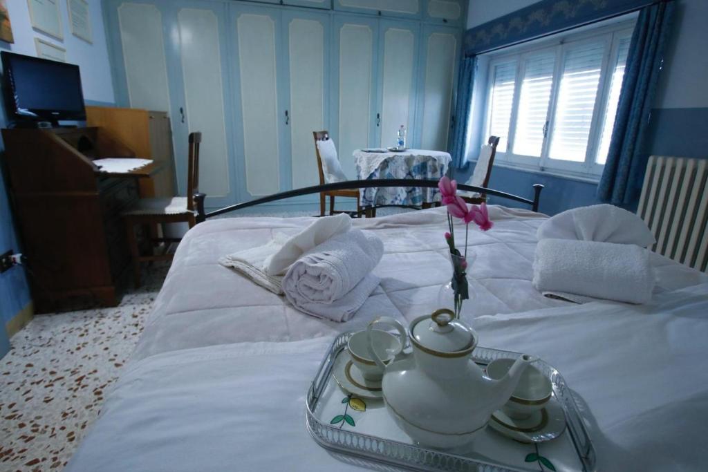 Łóżko lub łóżka w pokoju w obiekcie Bed&Breakfast 1912