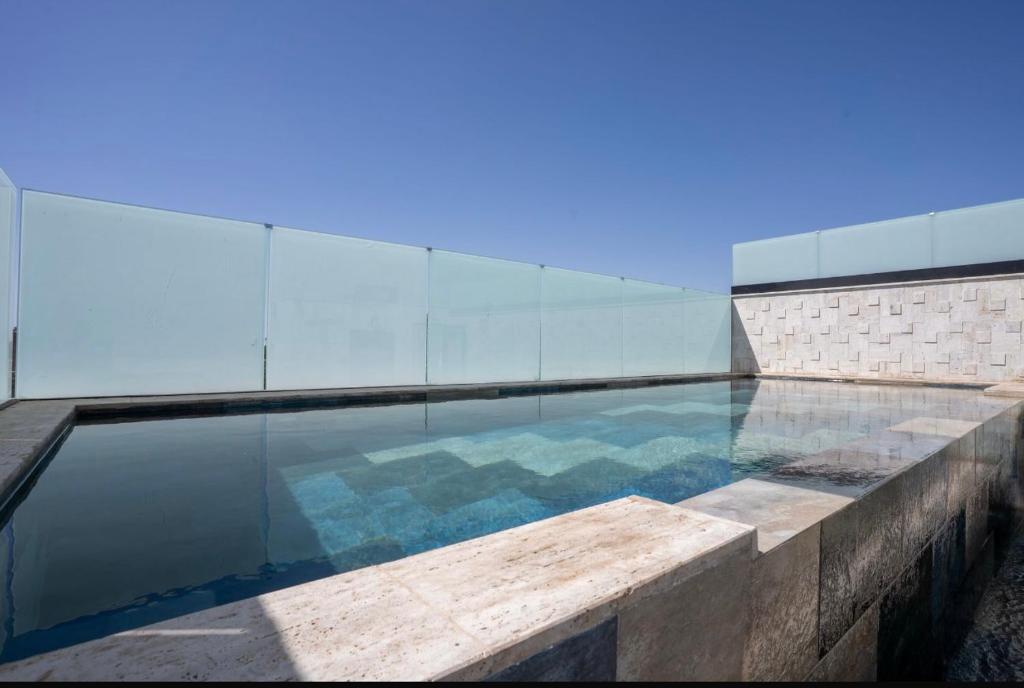 Bazén v ubytování Triplex De Luxe Ocra piscine privée nebo v jeho okolí