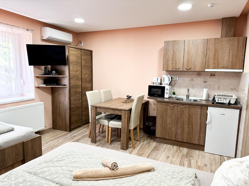 Kuchyň nebo kuchyňský kout v ubytování KK Apartment
