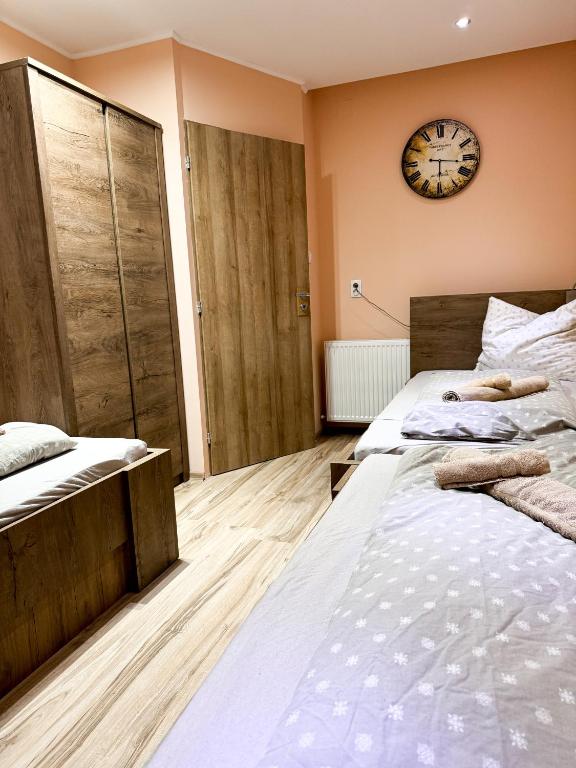Postel nebo postele na pokoji v ubytování KK Apartment