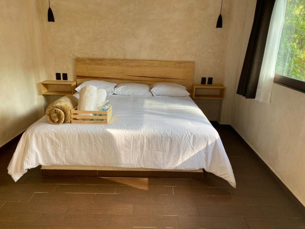 Postel nebo postele na pokoji v ubytování Villa Chica