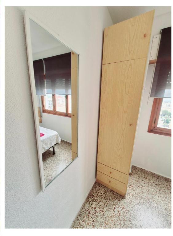 Postel nebo postele na pokoji v ubytování APARTAMENTO VISTAS AL MAR, 11 Planta, 50M PLAYA!!