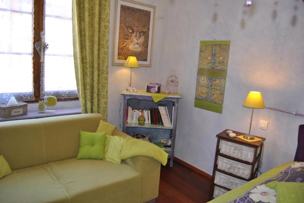 Posezení v ubytování Appartements & Chambres Les Loges du Capucin