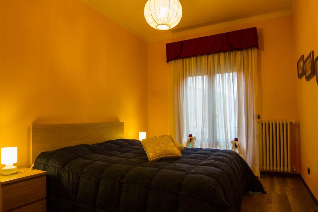 Posteľ alebo postele v izbe v ubytovaní A Casa Nostra