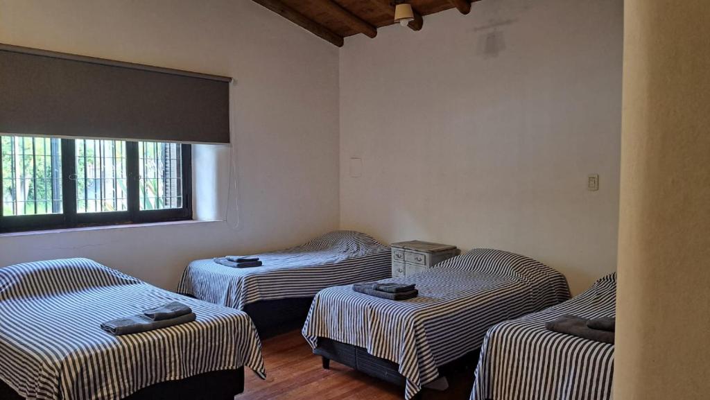 Ein Bett oder Betten in einem Zimmer der Unterkunft Casona de coria