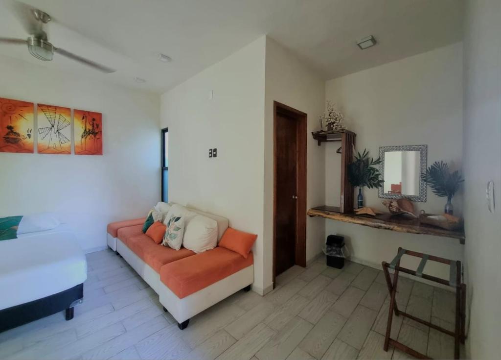 Postel nebo postele na pokoji v ubytování Hotel Brisas Bacalar