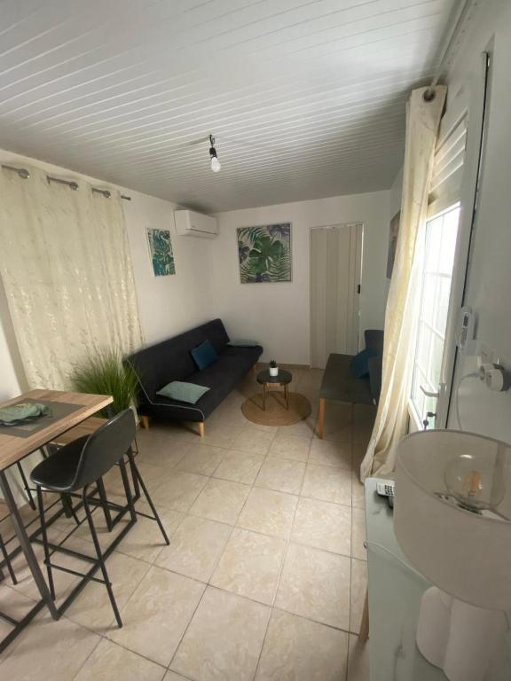 Posezení v ubytování La Suite Odile Piscine