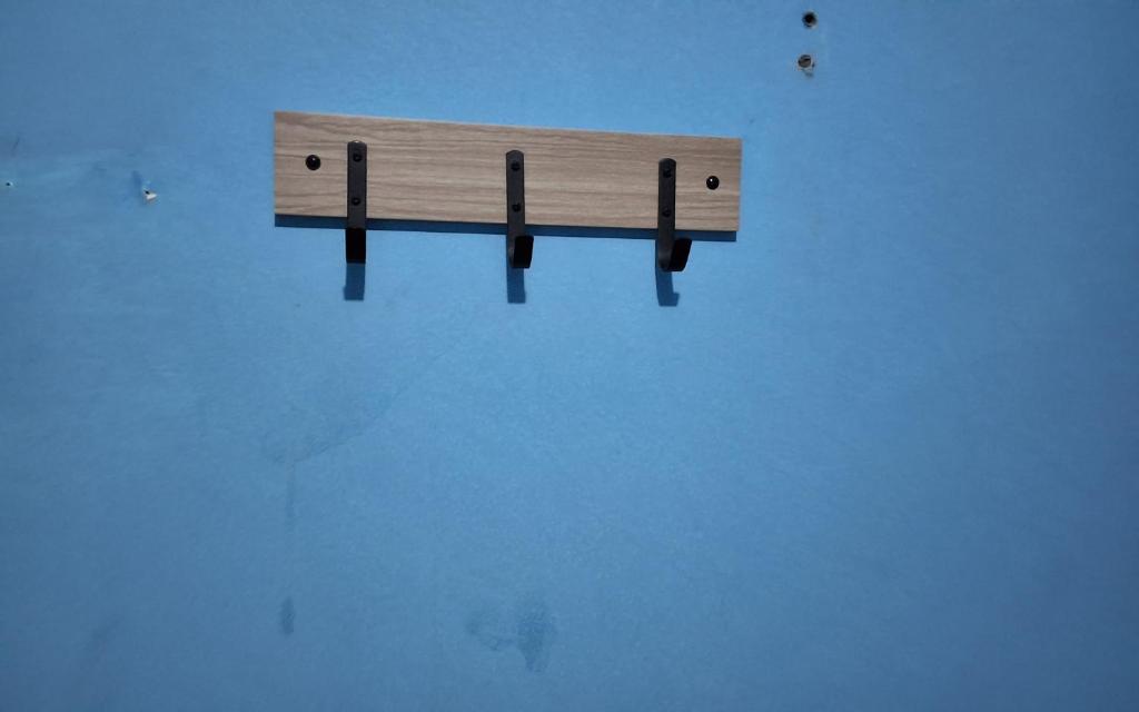 a wooden bench in the middle of the water at Apto B com cozinha em Macapá Infraero in Macapá