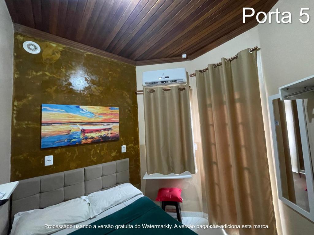 Ένα ή περισσότερα κρεβάτια σε δωμάτιο στο Casa Galaxy