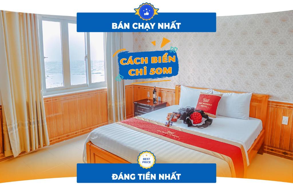 Postel nebo postele na pokoji v ubytování Ngọc Hân Hotel By The Moment