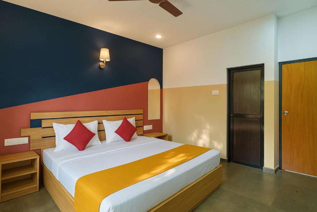Postel nebo postele na pokoji v ubytování Hotel Calangute Beach Imperial
