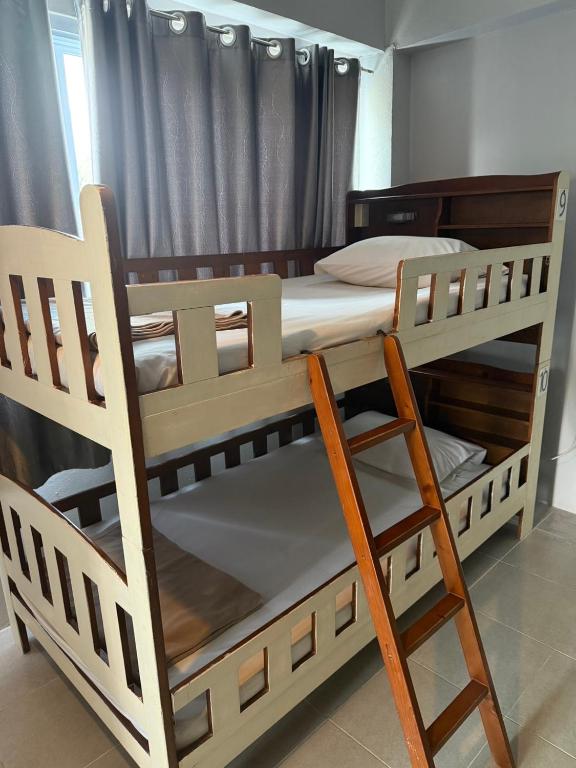 Postel nebo postele na pokoji v ubytování Ler Hostel 65